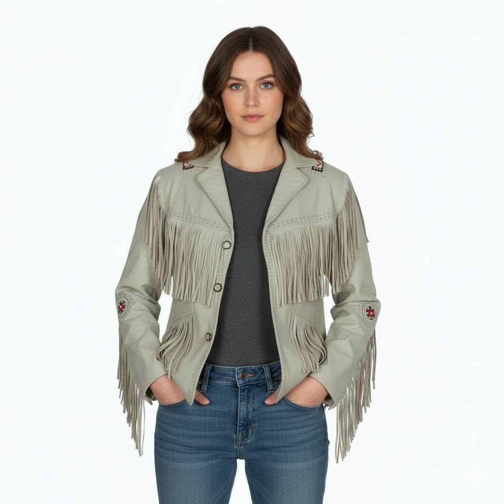 Woman wearing a light green fringed jacket on a white background