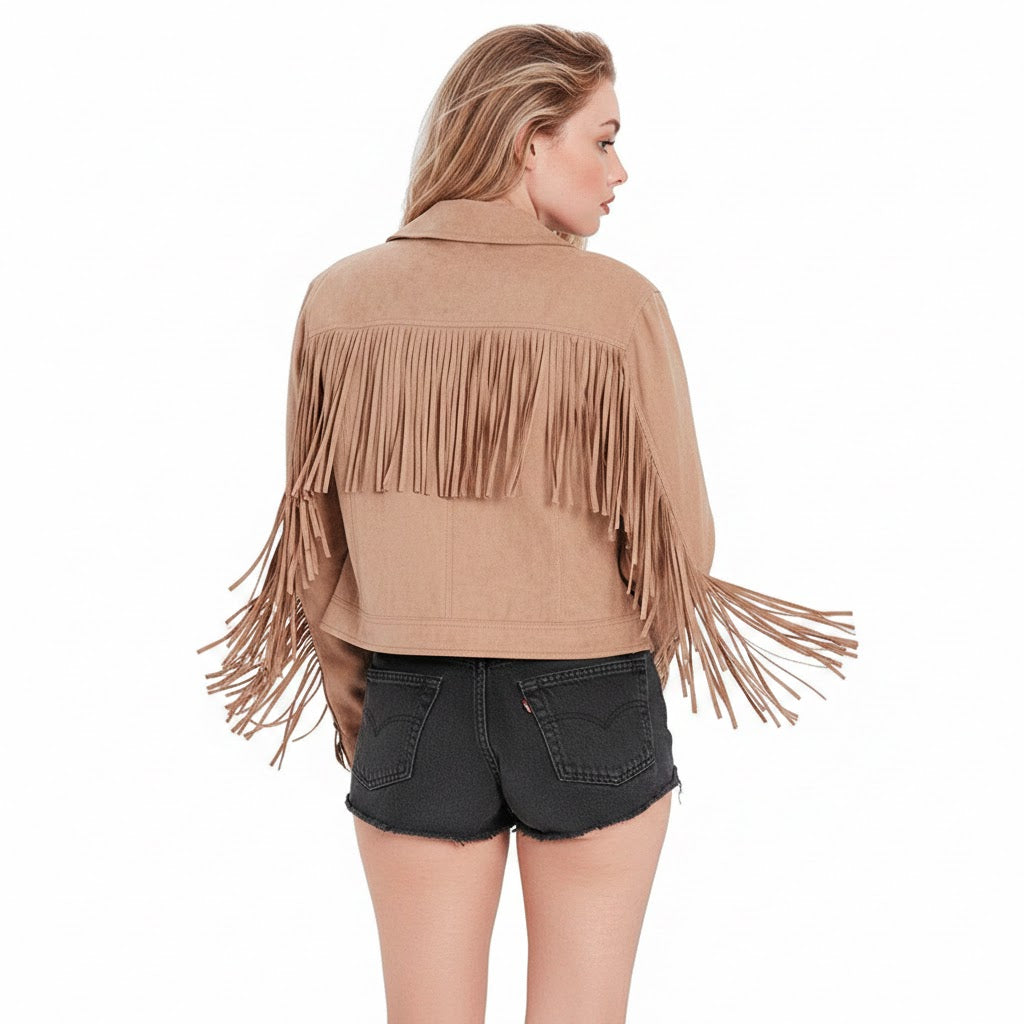 Woman wearing a beige fringe jacket on a white background