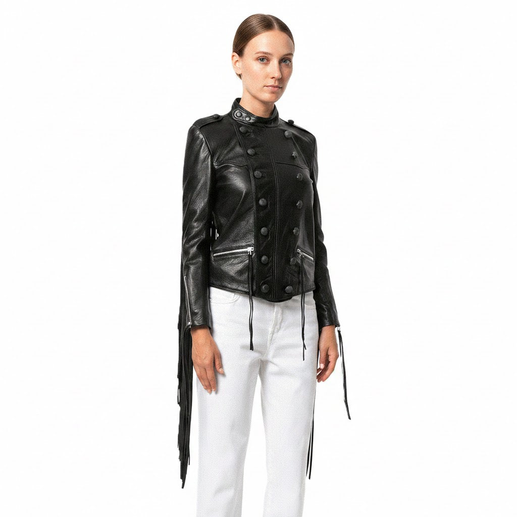 Woman wearing a black leather jacket and white pants on a white background