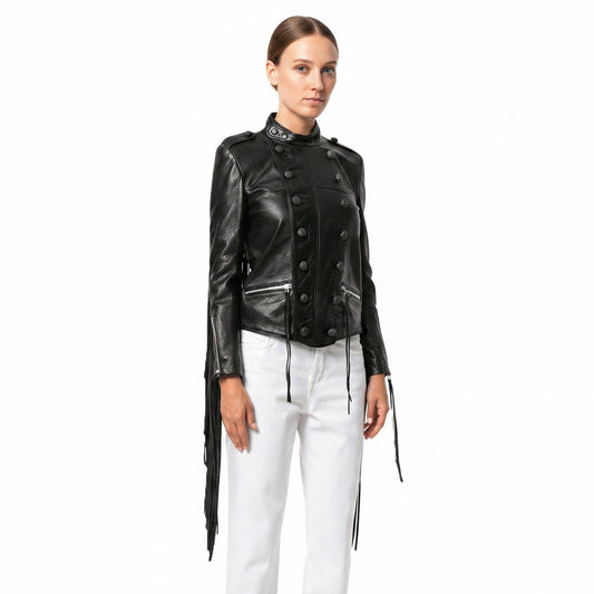 Woman wearing a black leather jacket and white pants on a white background