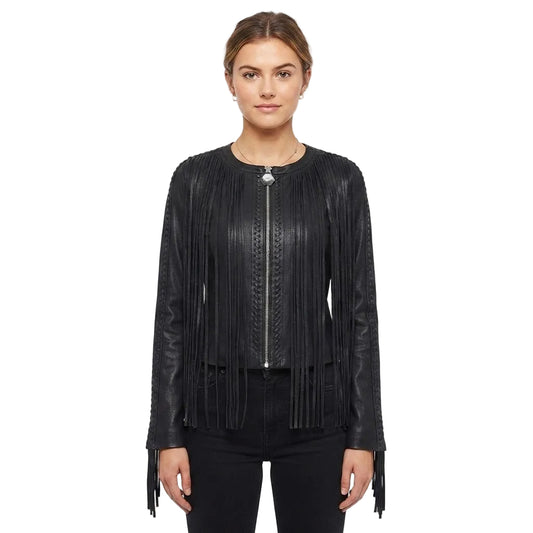 A woman modeling a black leather fringe jacket with a silver zipper and a decorative silver clasp at the neckline, paired with black pants against a plain white background.