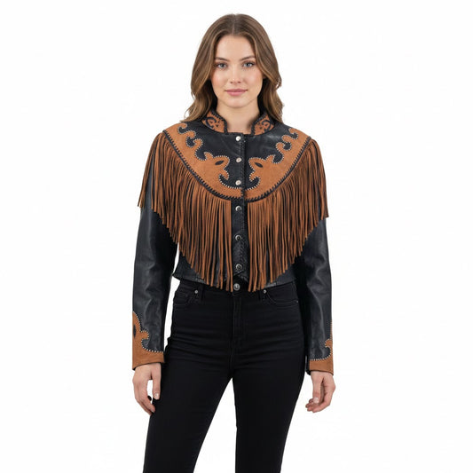 Woman wearing a black and brown leather jacket with fringe on a white background