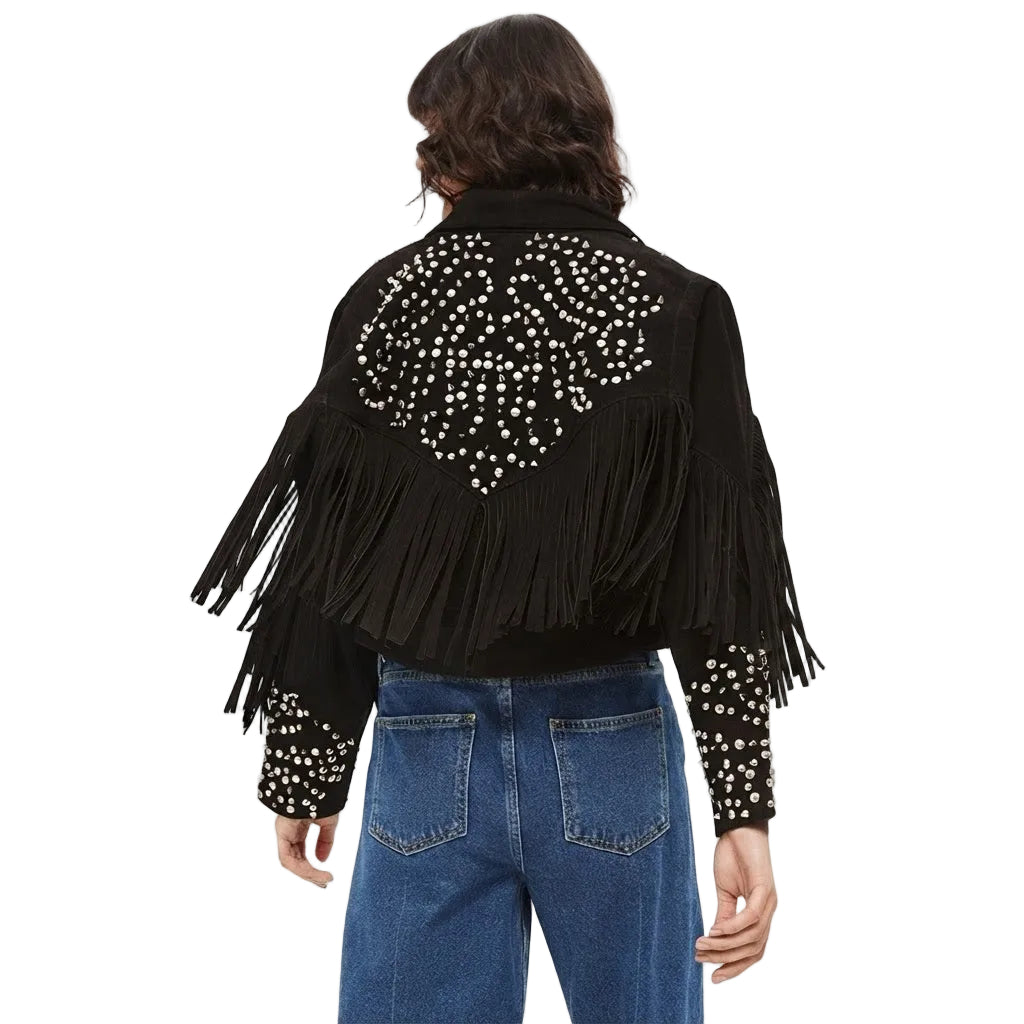 A model shown from the back wearing a black suede fringe jacket decorated with white rhinestones, paired with blue jeans, against a plain white background.