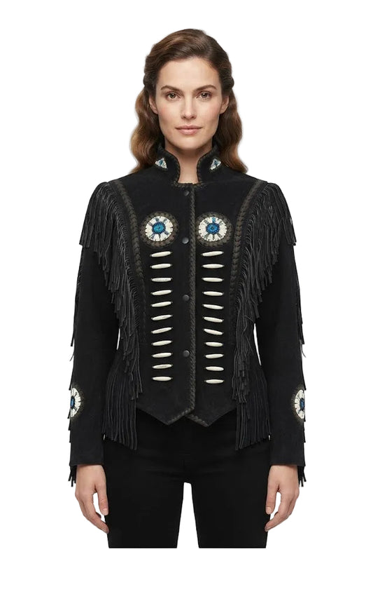 A woman modeling a black fringed jacket with silver-toned buttons and blue-and-white embroidered circular details on the chest and cuffs, photographed against a plain white background.