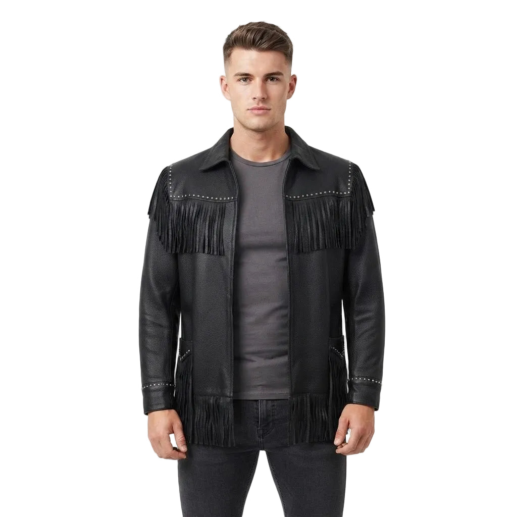 A man modeling a black leather fringe jacket with silver stud detailing, worn over a dark gray t-shirt and dark jeans, against a plain white studio background.