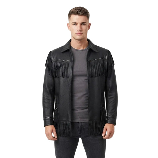 A man modeling a black leather fringe jacket with silver stud detailing, worn over a dark gray t-shirt and dark jeans, against a plain white studio background.