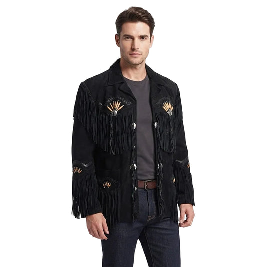 A man modeling a black suede fringe jacket with gold embroidered details and silver-toned buttons, paired with a dark gray t-shirt and dark jeans against a white studio background.