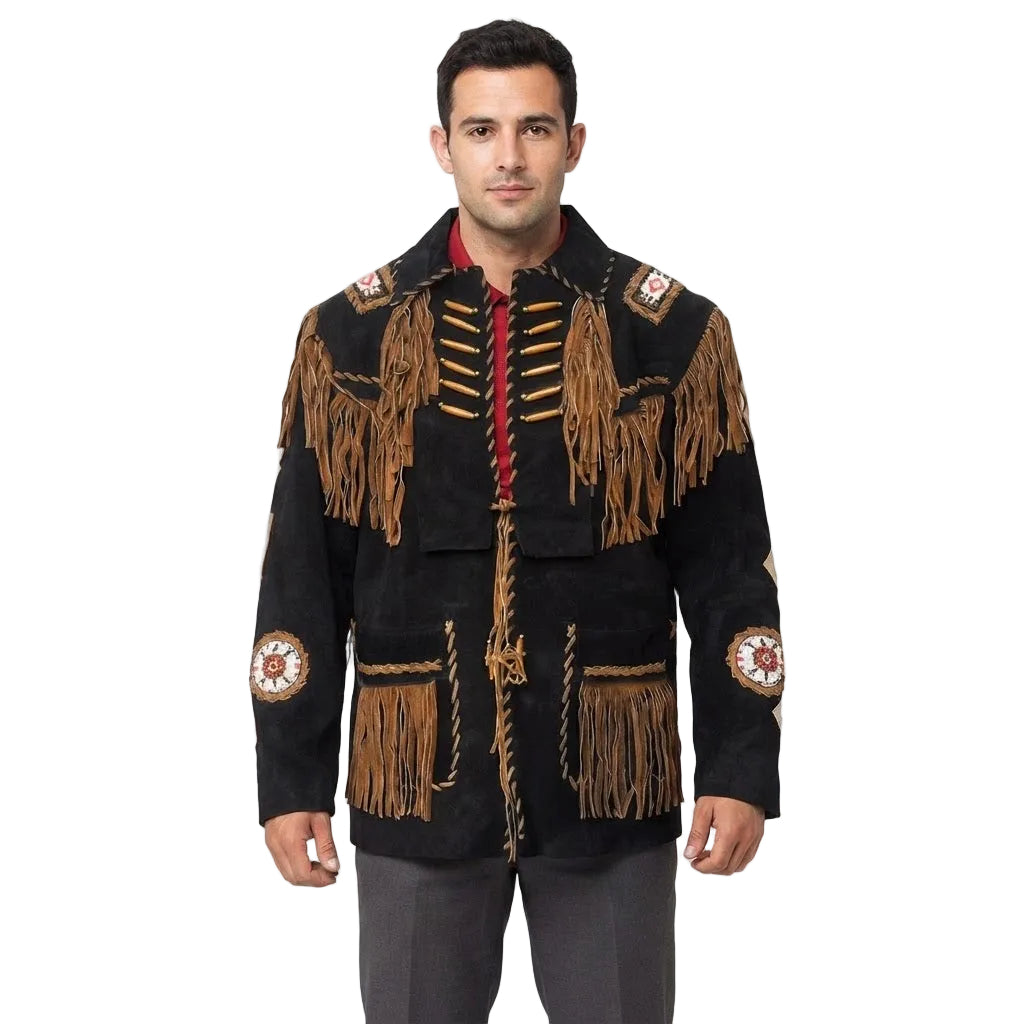 A man wear a black suede fringed jacket with tan fringe, red cord trim, and circular bead work on the sleeves, paired with gray pants against a white background.