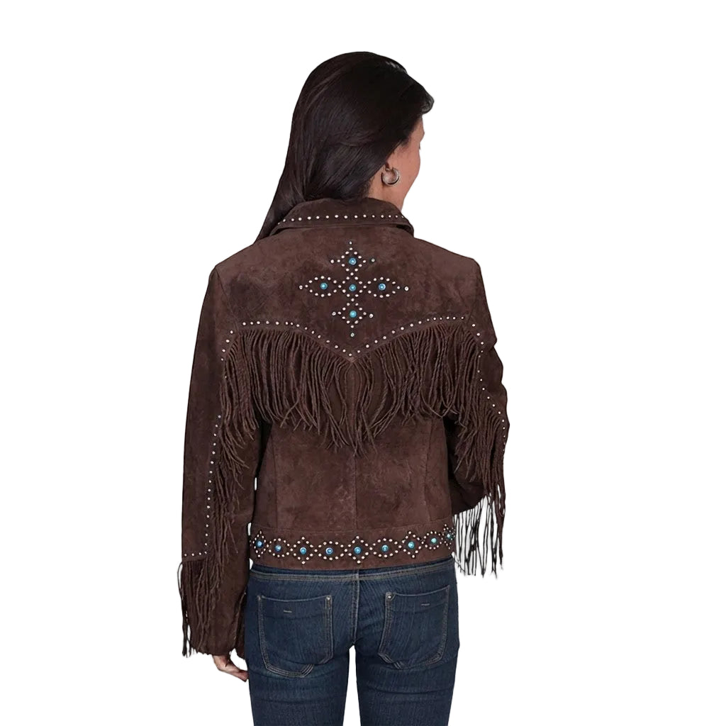 A woman viewed from the back wearing a dark brown suede fringe jacket with turquoise and silver beadwork, paired with blue jeans, against a plain white background.