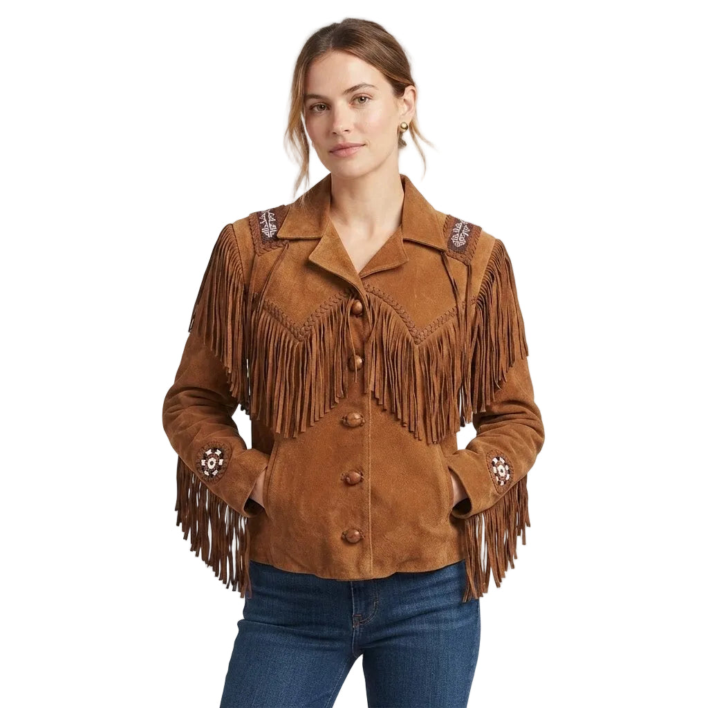 A woman wearing a brown suede fringe jacket with decorative embroidered details on the shoulders and cuffs, paired with blue jeans, against a plain white background.
