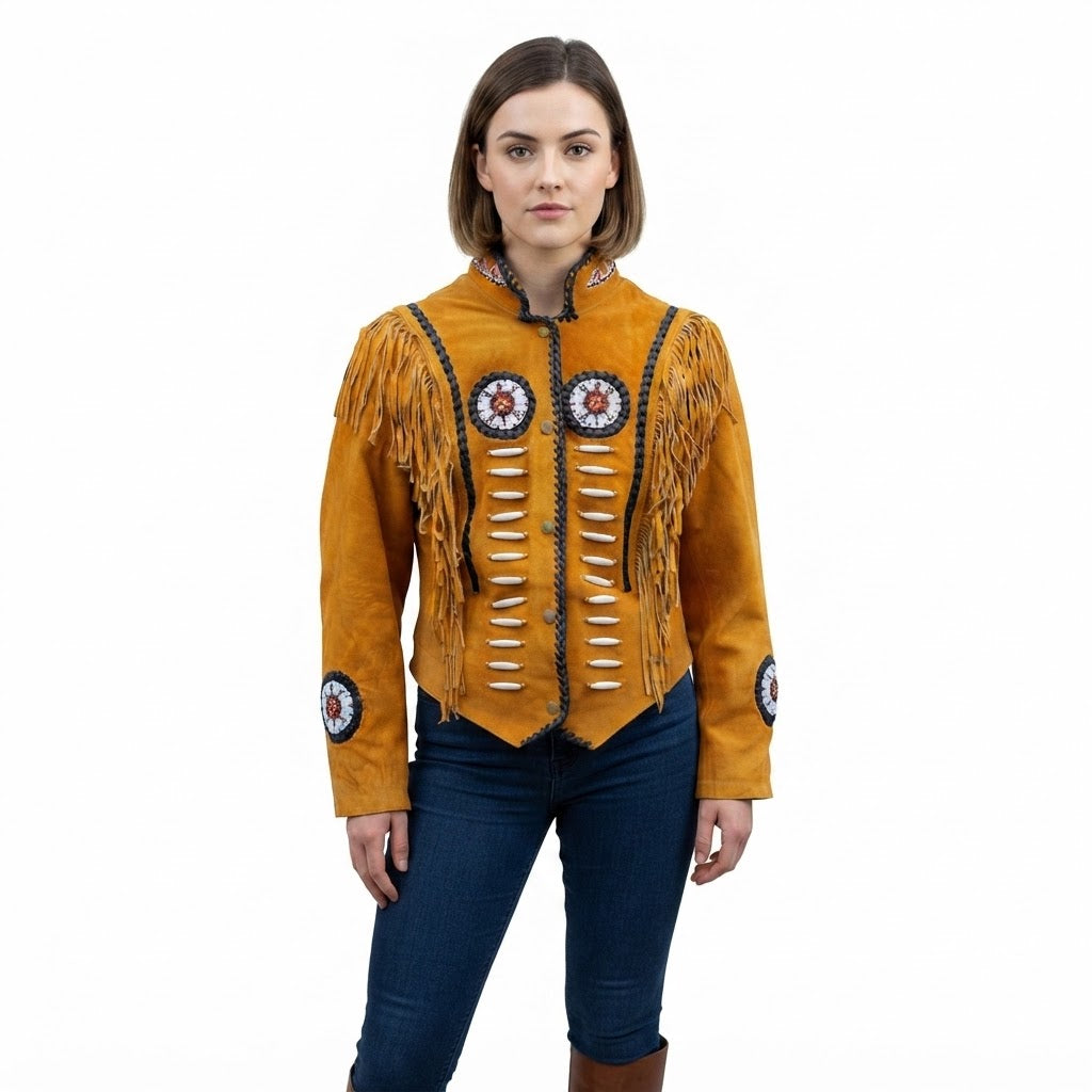 A woman wear a brown suede fringe jacket with intricate bead work and circular embroidered details on the chest and sleeves, paired with dark blue jeans against a plain white background.