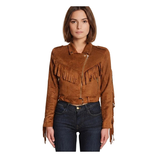 A woman wearing a cropped brown suede fringe jacket with zipper, paired with dark blue jeans, against a plain white background.