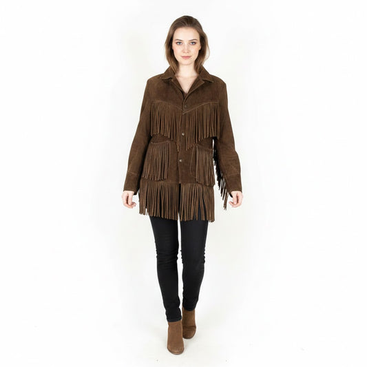Woman wearing a brown fringed jacket on a white background