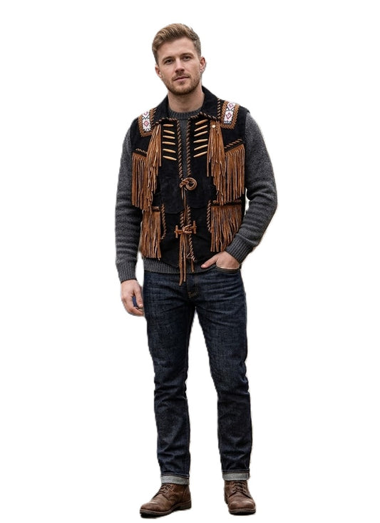 Man wearing a fringed vest with dark jeans on a white background