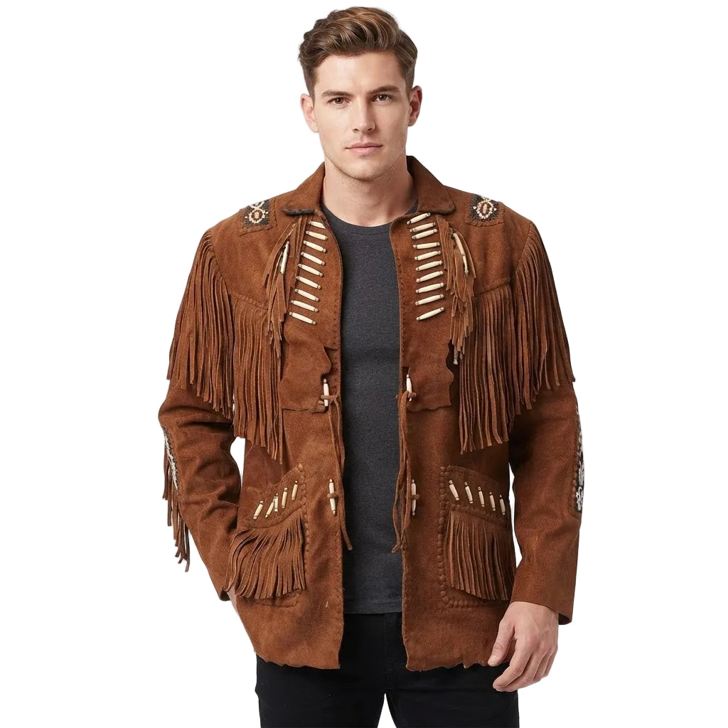 A man wearing a brown suede fringe jacket with decorative bead and leather embellishments, styled over a dark gray t-shirt and black pants, against a plain white studio background.