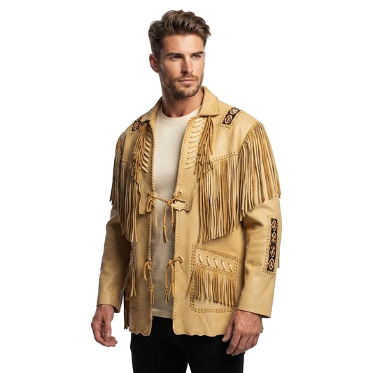 A man modeling a beige leather fringed jacket with decorative embroidery and tie closures, worn over a cream t-shirt and black pants against a plain white background.