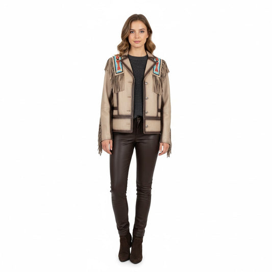 Woman wearing a beige vest with colorful patterns and fringes on a white background