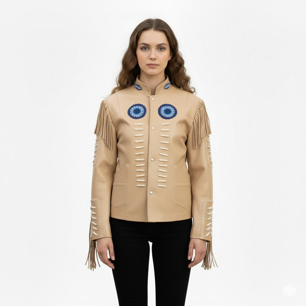 Beige leather jacket with fringe and blue eye designs on a white background