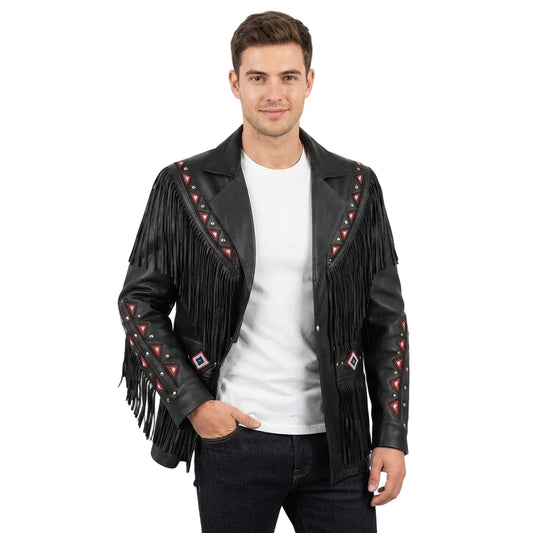 A man modeling a black leather fringe jacket with red and white geometric beadwork details on the shoulders and sleeves, worn over a white t-shirt and dark jeans against a light gray background.