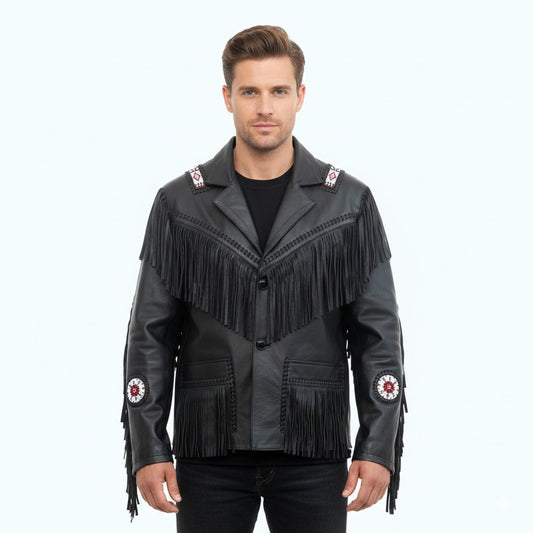 Man wearing a black leather jacket with fringes and patches on a white background