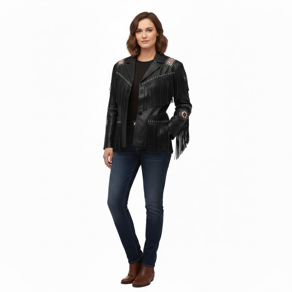 Woman wearing a black leather jacket with fringe and studs on a white background