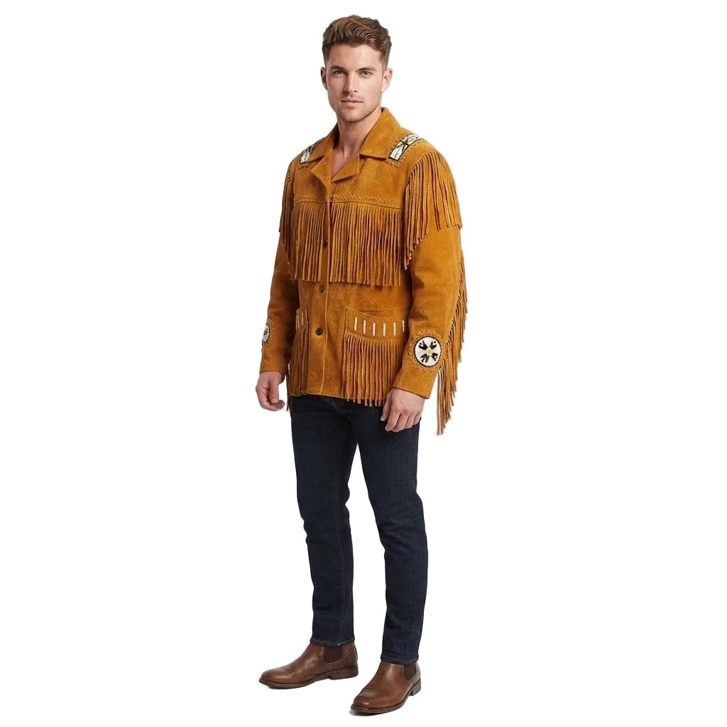 A man modeling a tan suede fringed jacket with western-style embroidery, paired with dark jeans and brown boots, against a plain white studio background.
