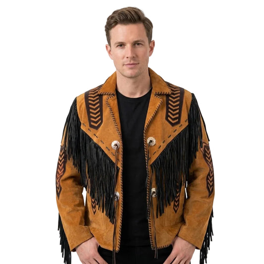 A man wearing a brown suede western-style jacket with black fringe, black geometric embroidery, and silver-tone snap buttons, over a black t-shirt, against a plain white studio background.