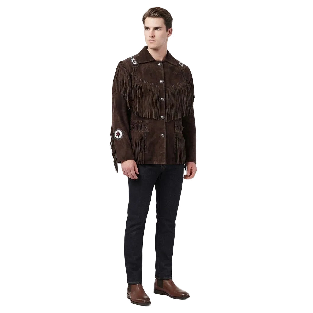 A man modeling a dark brown suede fringe jacket with western-style details, paired with black jeans and brown boots, against a plain white studio background.